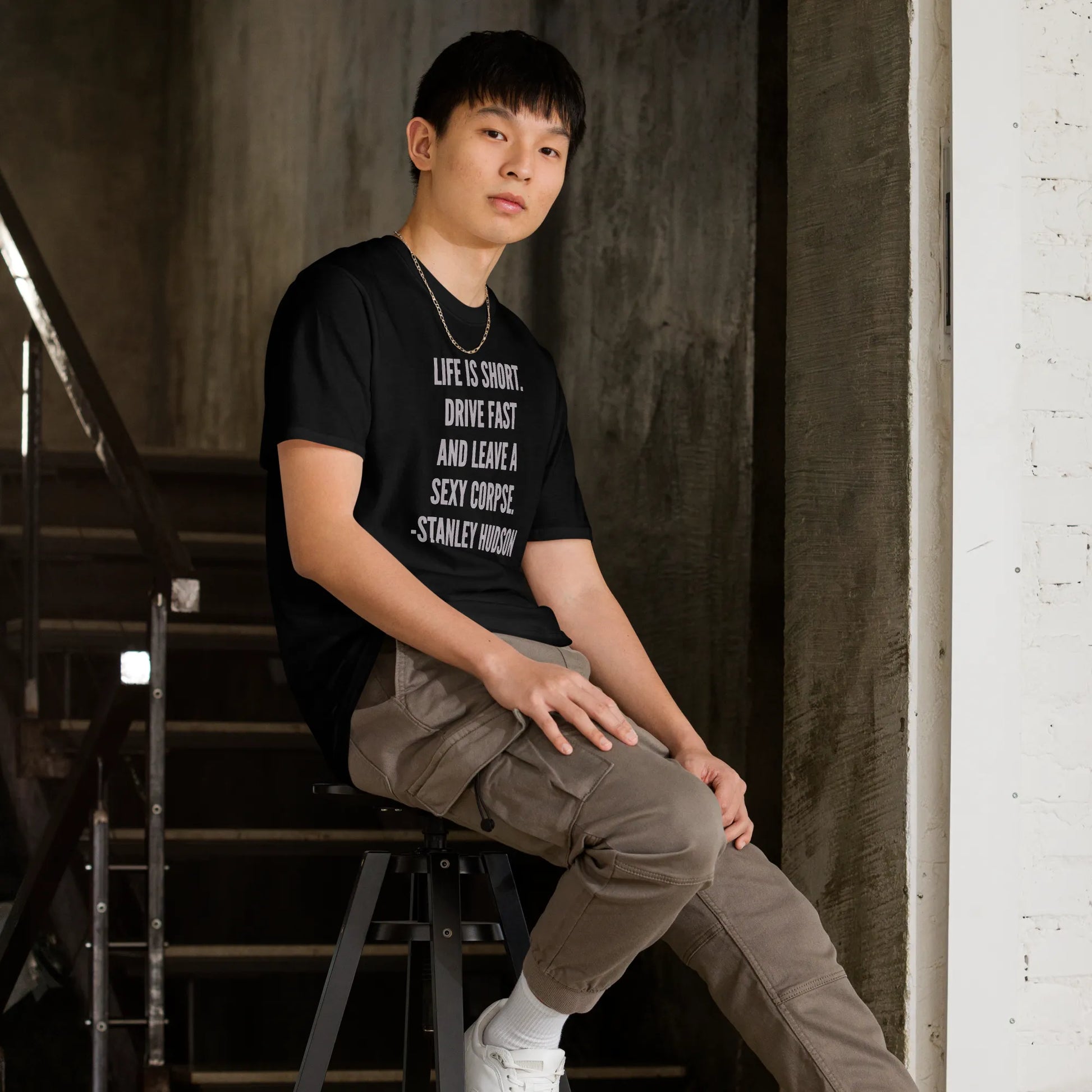Life is Short Tee in Black on man on stool